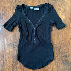 Urban outfitters out from under black short sleeve Henley top.